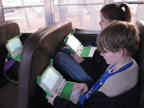 Children using XO computers on a rural Arkansas school bus