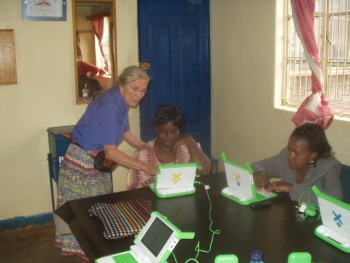 2008 deployment of 6 OLPCs to the Kibwezi Educational Centre in Kenya. In this photo is Diane Reimer from Burke Presbyterian Churh along with two teachers from the Imani Primary School.