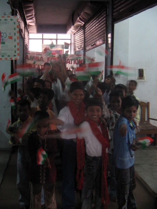 caption 15th August was India's 60th Independence Day. Kids from the Mandawali Faizalpur slum clusters celebrated it at their school at Amba Foundation