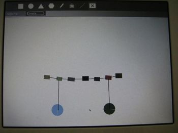 Physics activity photo on XO bridge with 2 hanging balls